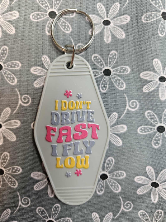 Retro Motel Keychain: I Don't Drive Fast I Fly Low