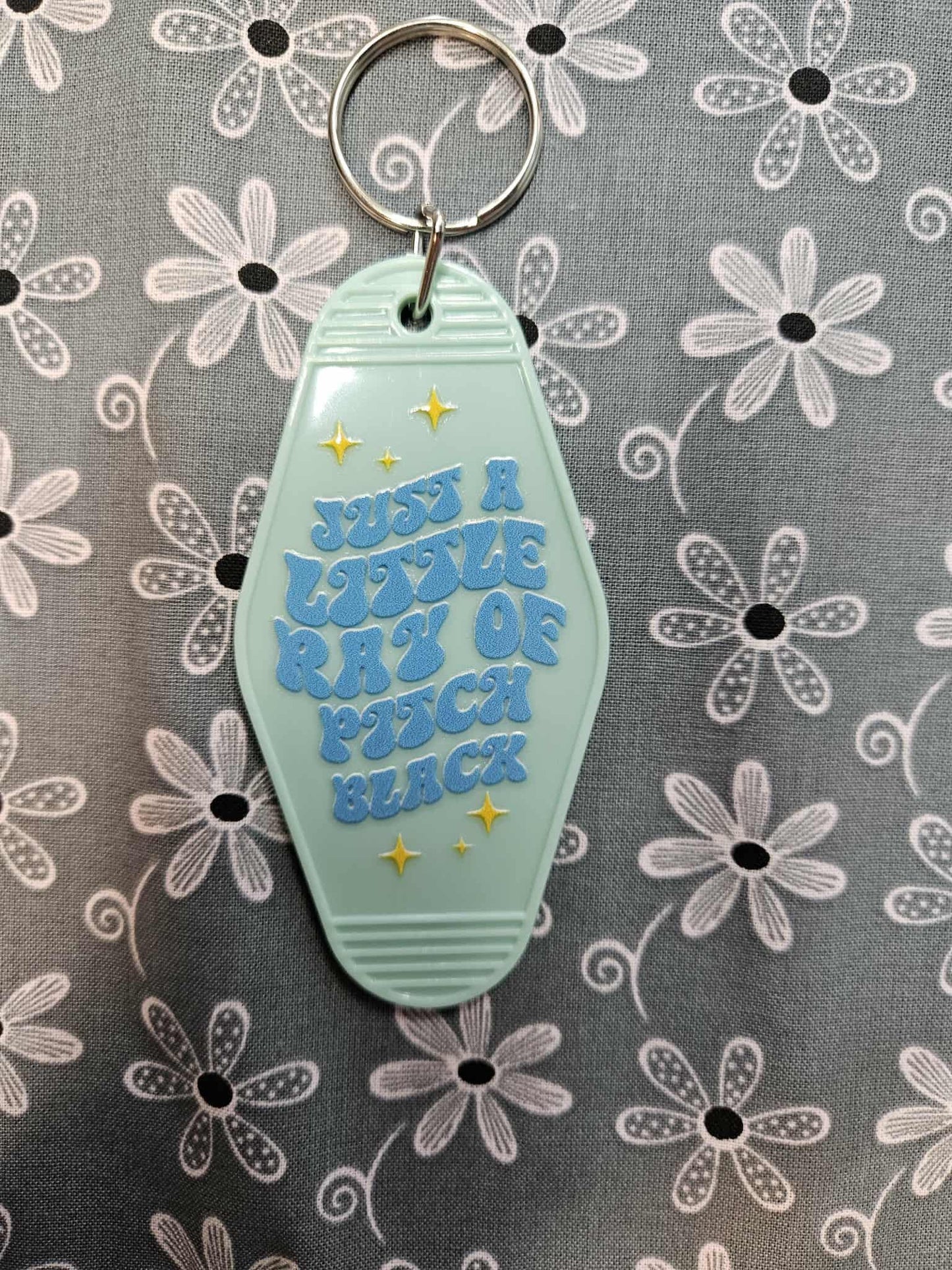 Retro Motel Keychain: Little Ray Of Pitch Black