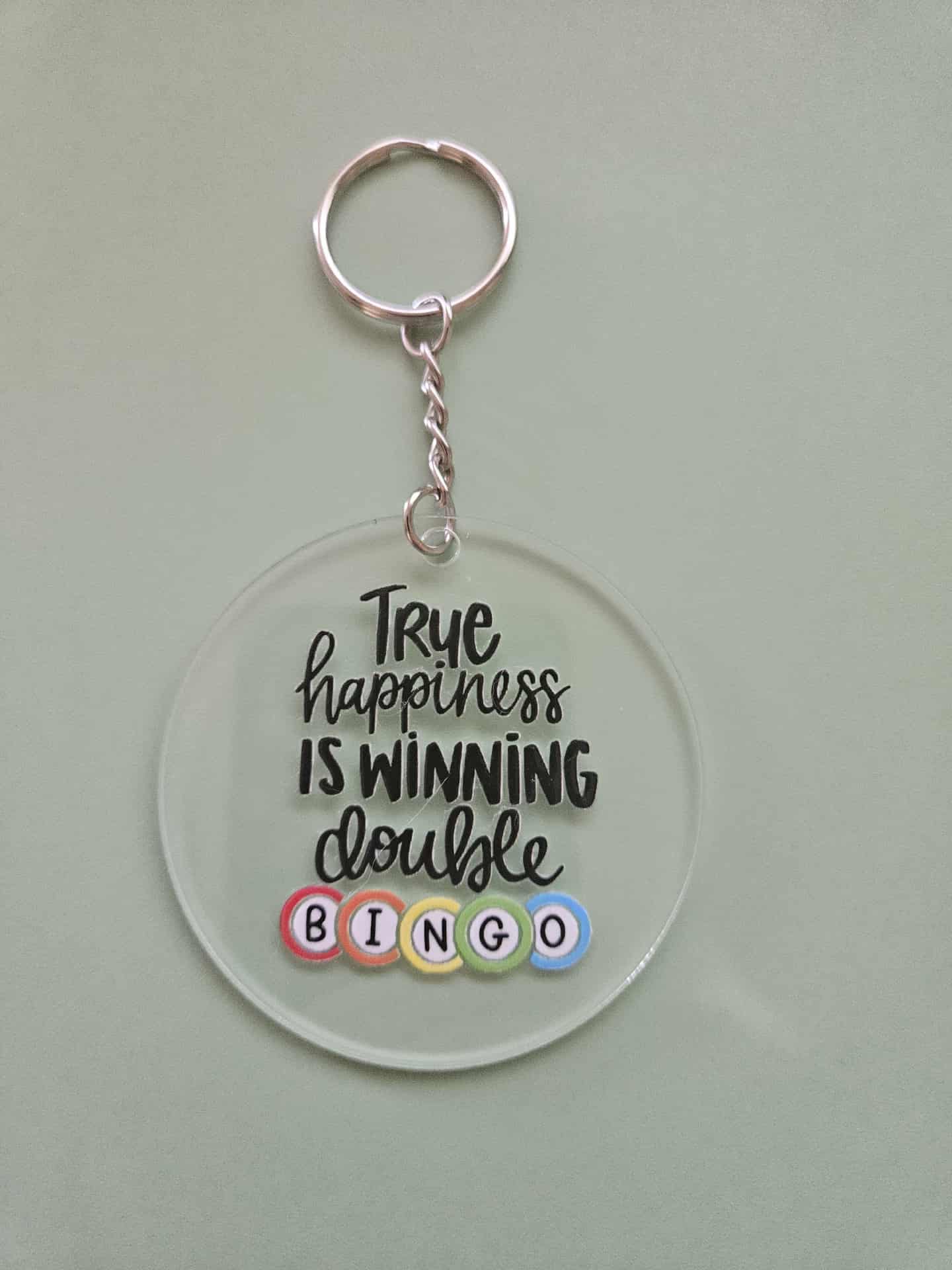 Clear Acrylic 3" Round Keychain With UV DTF Sticker True Happiness Is Winning Double Bingo