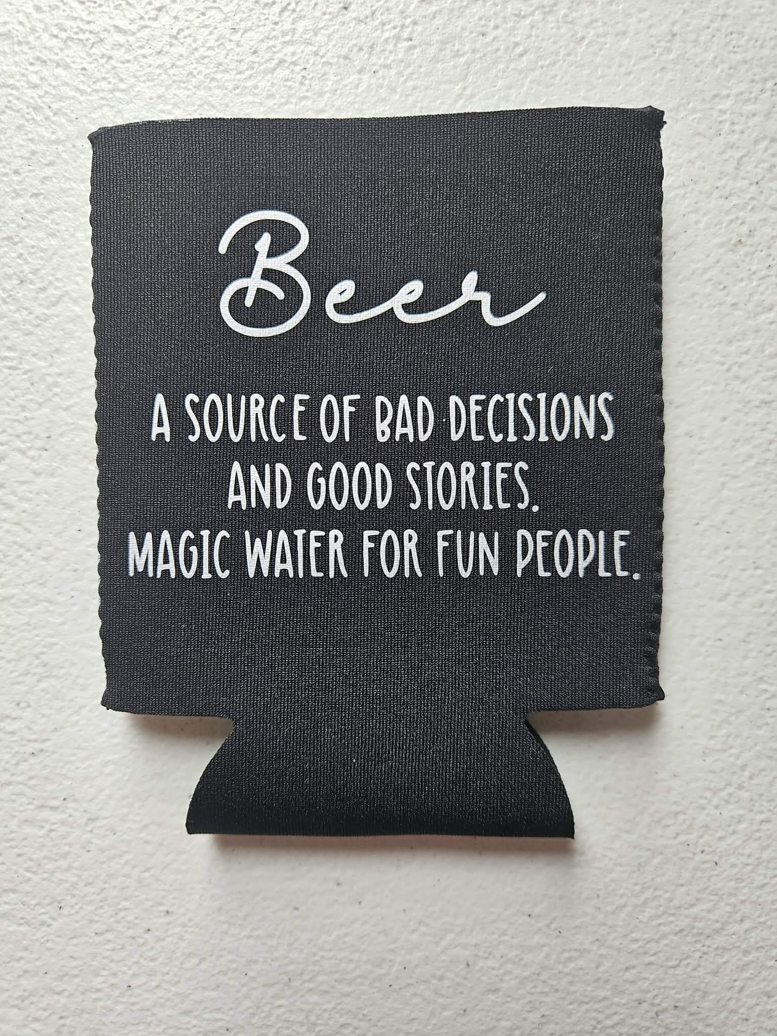 Beer A Source Of Bad Decisions And Good Stories Magic Water For Fun People Koozie Black & Silver - Joyfully Unique Things