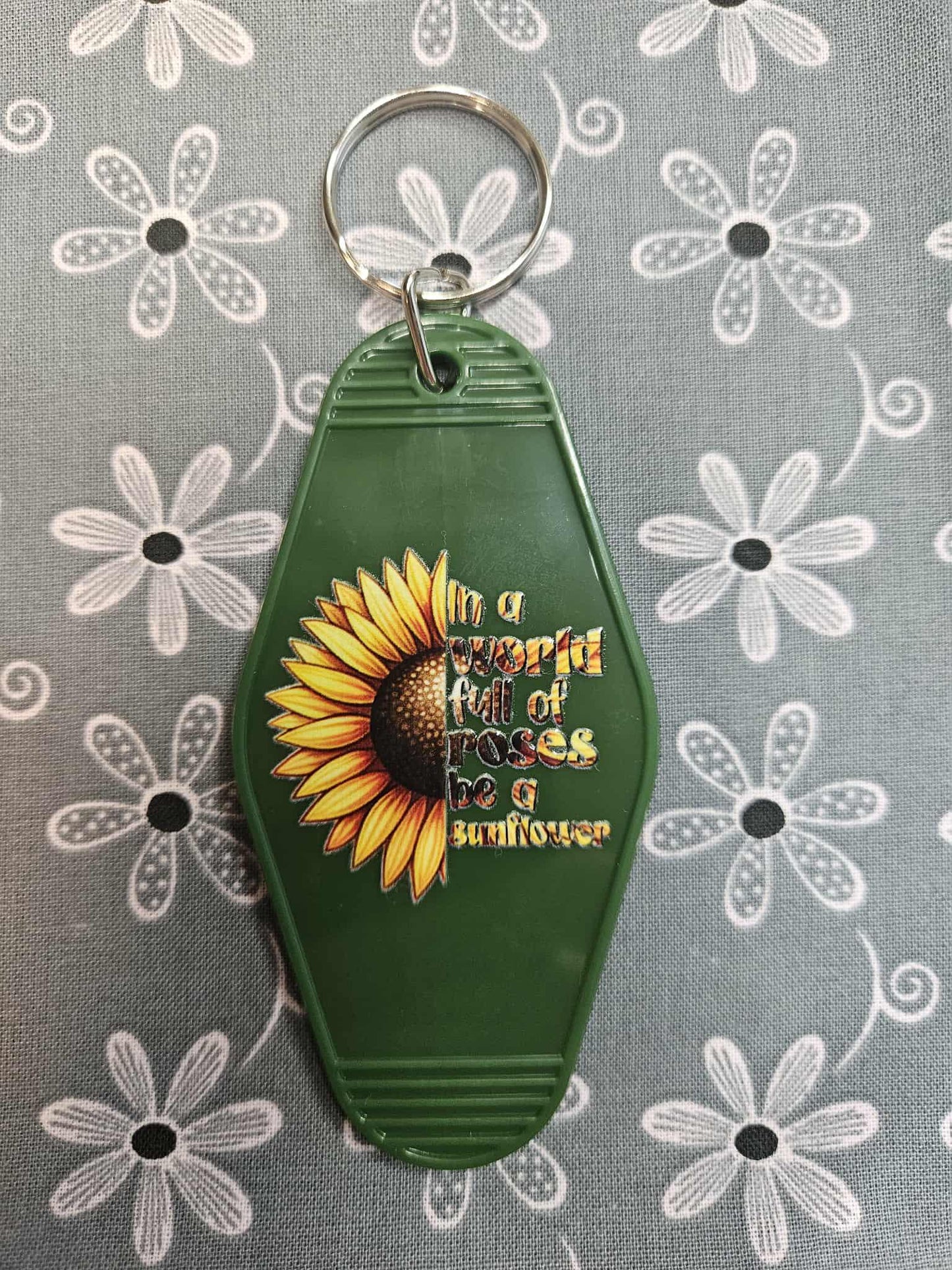 Retro Motel Keychain: In A World Full Of Roses Be A Sunflower - Joyfully Unique